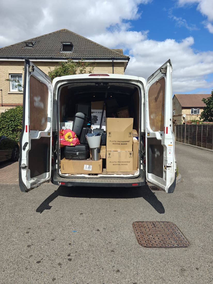 Kittoe Removals and Waste - fully loaded removals van, doors open